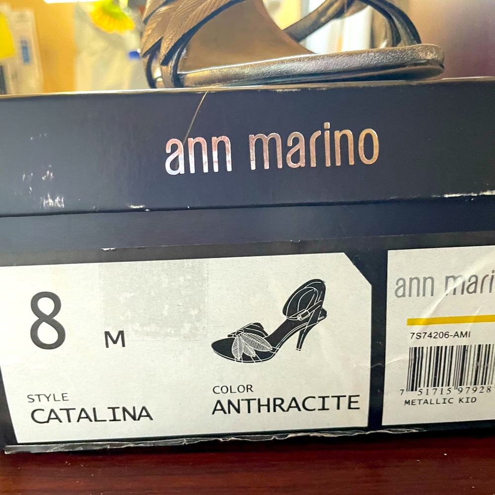Metallic colored heel with ankle strap. Fair condition.
